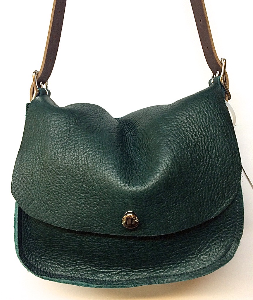 Big sling with button closure $225.in green with golden latigo strap